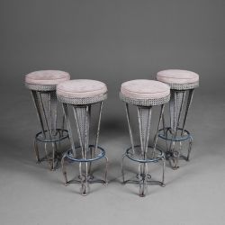 SET OF FOUR 1940S FRENCH MATHIEU MATÉGOT STYLE BAR STOOLS WITH PERFORATED METAL BASES.
