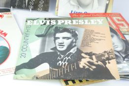 A COLLECTION OF ELVIS PRESLEY LPs, BOOKS & EPHEMERA (30).