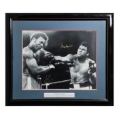 THE RUMBLE IN THE JUNGLE, ALI & FOREMAN SIGNED PHOTOGRAPH.