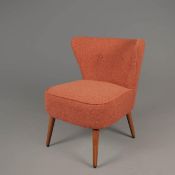 DUNELM COCKTAIL CHAIR IN ORANGE BOUCLE UPHOLSTERY.
