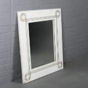 TESSELATED STONE WALL MIRROR WITH BRASS INLAY.