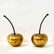 PAIR OF OVERSIZED GILT FINISH CHERRIES.
