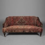 VICTORIAN CARPET UPHOLSTERED SOFA.