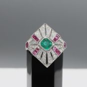 A PLATINUM RUBY, EMERALD AND DIAMOND SET DRESS RING