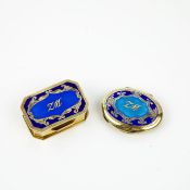 TWO SILVER-GILT AND ENAMELLED PILL BOXES.