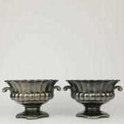 PAIR OF CLASSICAL CERAMIC URNS IN A LUSTRE GLAZE.