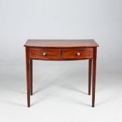 GEORGE III MAHOGANY BOWFRONT WRITING TABLE.