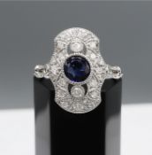 A PLATINUM SAPPHIRE AND DIAMOND DRESS RING