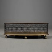 VICTORIAN BRASS AND IRON FENDER.