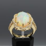 A 9CT GOLD OPAL AND DIAMOND SET DRESS RING