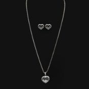 A 9CT WHITE GOLD DIAMOND PENDANT AND EARRINGS SET