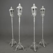 FLOOR STANDING STORM LANTERNS, A SET OF 4