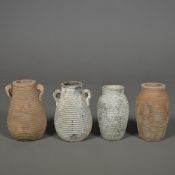 TERRACOTTA URNS, 4 DIFFERING.