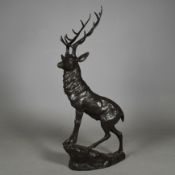 CAST BRONZE STAG ATOP ROCK