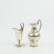 TWO SILVER MILK JUGS