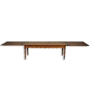 AN OAK DRAW-LEAF DINING TABLE