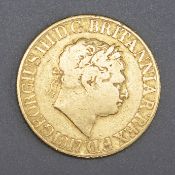 A GEORGE III GOLD 1817 SOVEREIGN COIN.