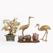 A PAIR OF JAPANESE METAL CRANES A THREE PIECE TEA SET AND SEMI-PRECIOUS TREE. (6)