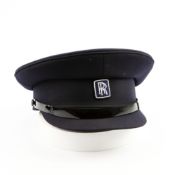 A ROLLS ROYCE CHAUFFEURS NAVY BLUE PEAKED HAT.