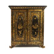 A CHINESE EXPORT BLACK AND GILT LACQUER MINIATURE COLLECTORS CABINET.