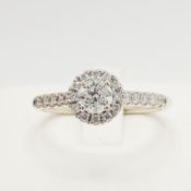 AN 18CT GOLD DIAMOND RING
