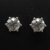 A PAIR OF DIAMOND EARRINGS