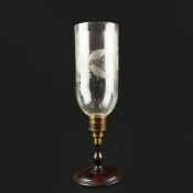 A 19TH CENTURY CANDLE LIGHT