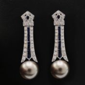 A PAIR OF PEARL EARRINGS