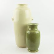 A LARGE CHINESE MONOCHROME VASE AND A CELADON VASE.
