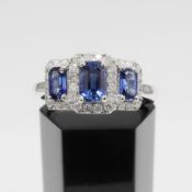 A PLATINUM SAPPHIRE AND DIAMOND RING