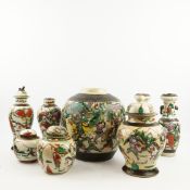A GROUP OF CHINESE CRACKLE GLAZE FAMILLE VERTE GINGER JARS AND VASES. (8)