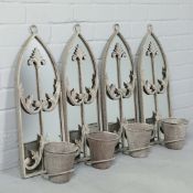 SET OF FOUR GARDEN MIRRORS WITH PLANT POTS.