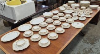 A SPODE FLEUR DE LYS GOLD DINNER SERVICE.
