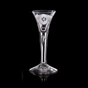 A RARE JACOBITE PLAIN STEM GLASS WITH PRINCE OF WALES FEATHERS