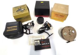Three fishing reels, an Avon Royal Supreme III in original box, a Mitchell garcia 300 (cased) and
