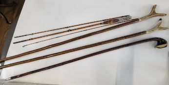 Three antique walking sticks including badger's head example with white metal point and two antler