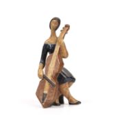 A 20th century ceramic figure of a cellist, in brown and blue glazes, impressed four-leaf clover