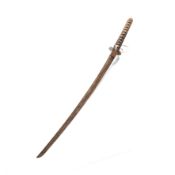 An early 20th century Japanese Katana sword with a ray skin grip, the single edged curved blade 71cm