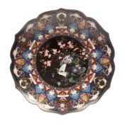 A large 19th century Japanese cloisonné charger with a cranes in a landscape 46cm diameter