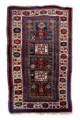 A green ground Kazak, Caucasus, all wool. Late 19th c. (231cm x 136cm) Detailed photos attached.