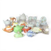 A collection of novelty teapots, to include Art Deco style, a Laura Ashley Hazelbury part tea set