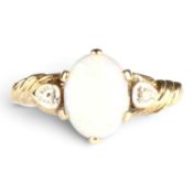 A 9 carat yellow gold opal and diamond three stone ring, 2.2g, size N/O