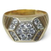 A 14 carat gold gentleman's pave set diamond ring, of hexagonal shape, with a textured shoulders,