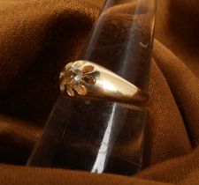 An 18 carat yellow gold diamond solitaire gypsy ring, size L/M, 2.8g