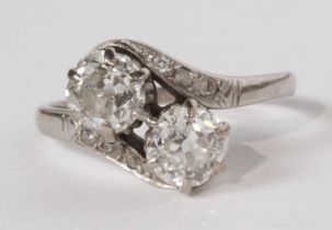 A 14 carat white gold two stone diamond ring, each stone approximately 0.75 carats, size O, 4.1g