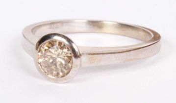 An 18 carat white gold cognac diamond solitaire ring, approximately 0.5 carats, size P, 3.5g