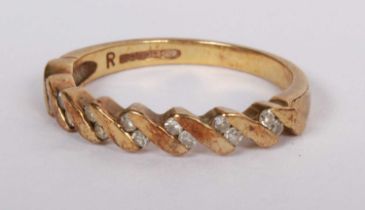 A 9 carat yellow gold diamond half hoop eternity ring, size L, 1.8g