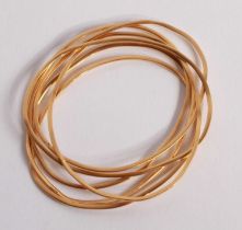 A set of six yellow metal bangles, likely Chinese, test as approximately 22 carat gold, 35g