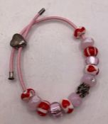 JEWELLERY : Pandora style bracelet with coloured beads and a turtle charm
