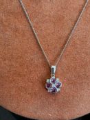 Jewellery : 18ct White Gold pendant and chain. Pendant with four small diamonds total weight 3g